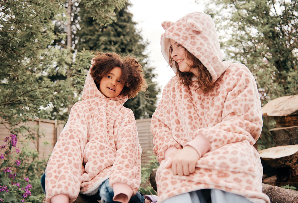 With most of our Snuggz Hooded Blanket designs available across all sizes, you can match up your design with the whole family for the ultimate Christmas matching photo! Get Snuggz with us together with the whole family
